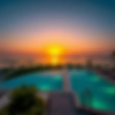 Stunning sunset view from a hotel terrace with private pool