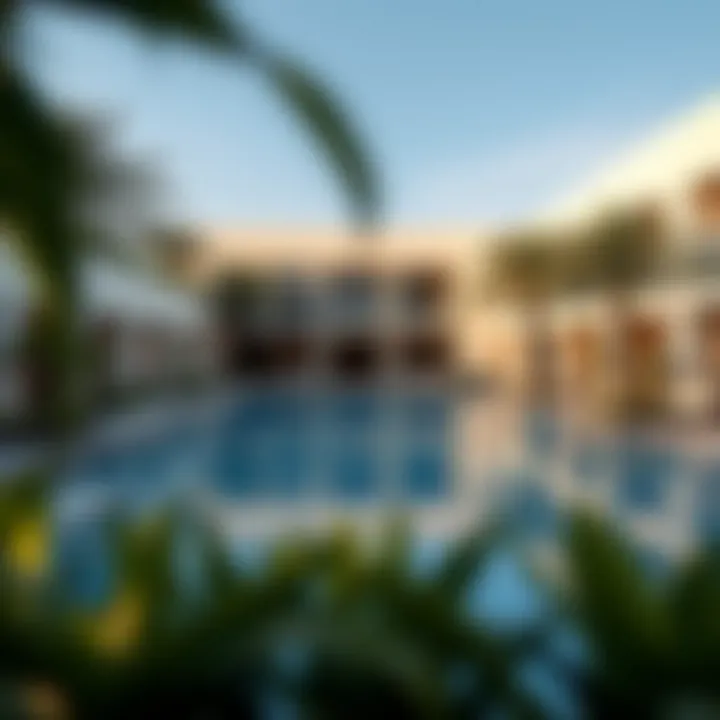 Elegant swimming pool area surrounded by lush greenery at Privé Residence