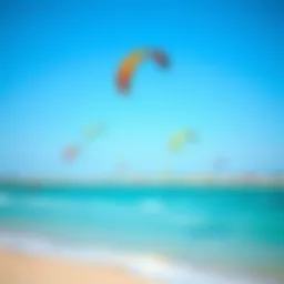Vibrant beach scene at Kite Beach with colorful kites and clear blue skies