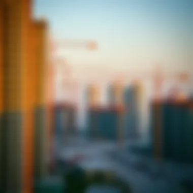 Construction site with cranes and developing buildings