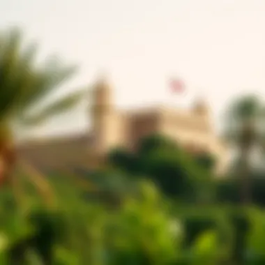Historical Fort Surrounded by Nature An ancient fort in Umm Al Quwain surrounded by lush greenery, symbolizing the emirate's rich history.